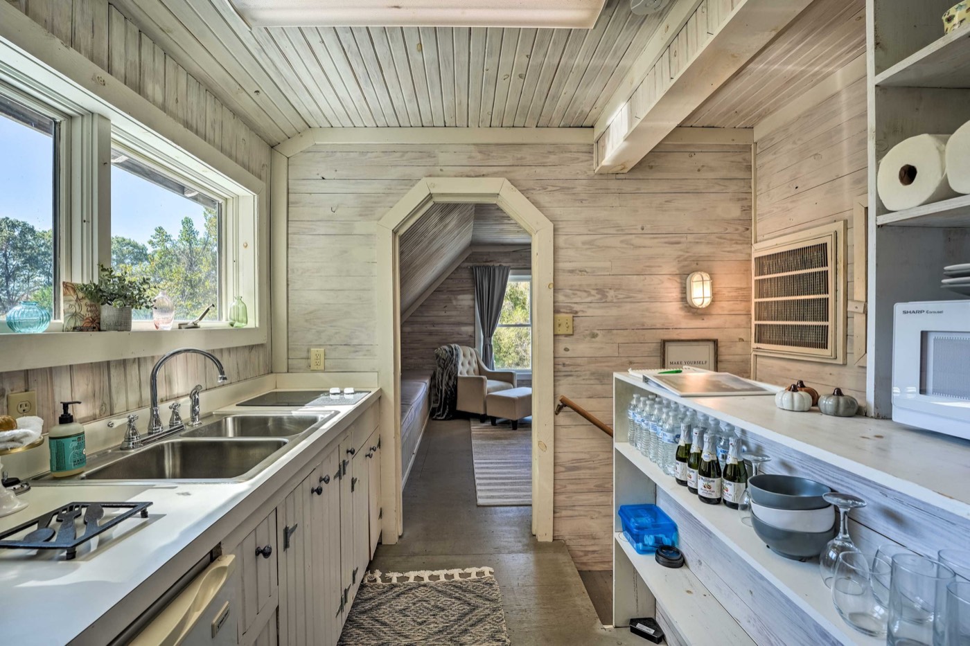 Loft kitchenette with sink and stovetop