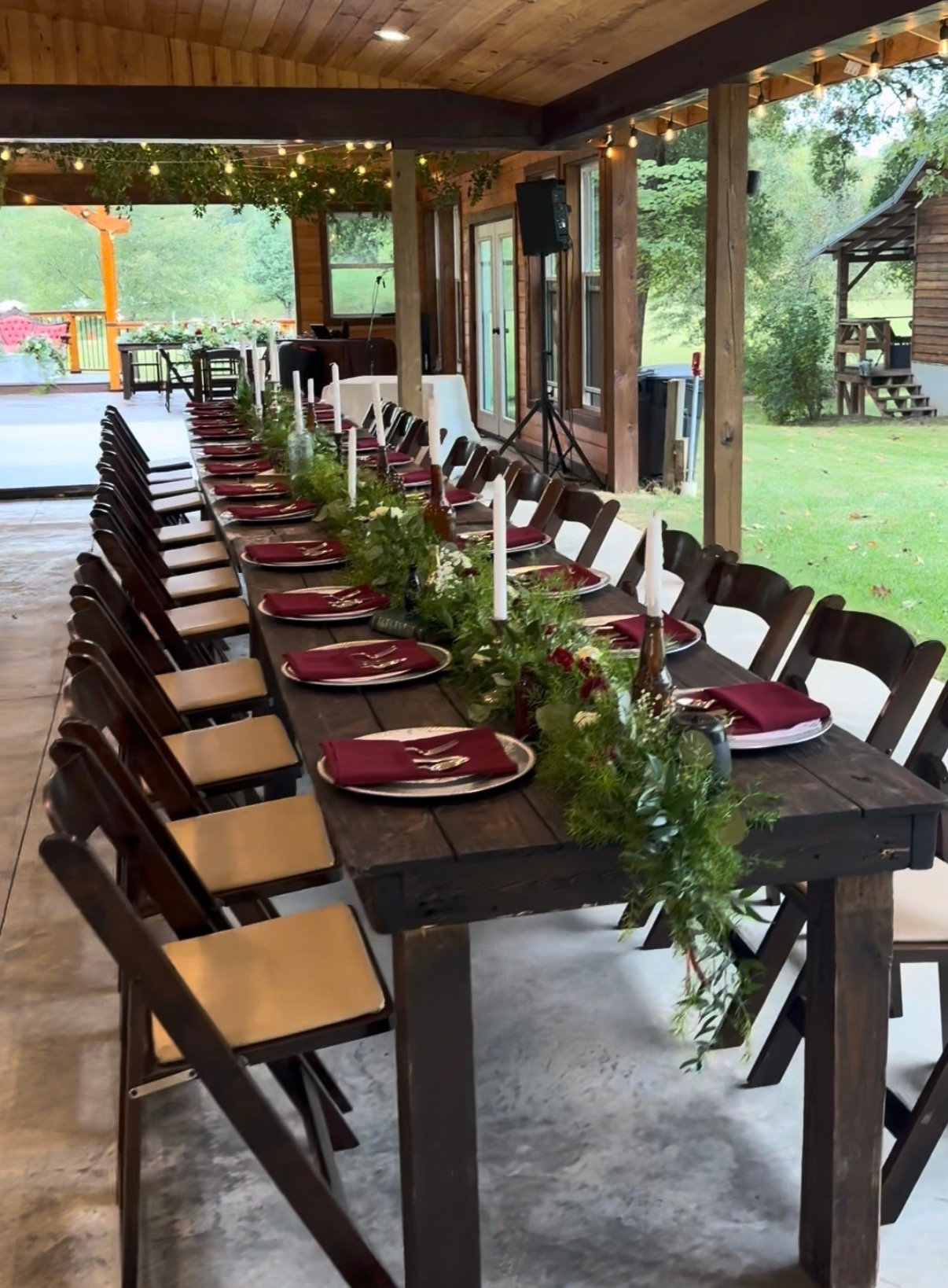 Long reception tables set inside The Pavilion